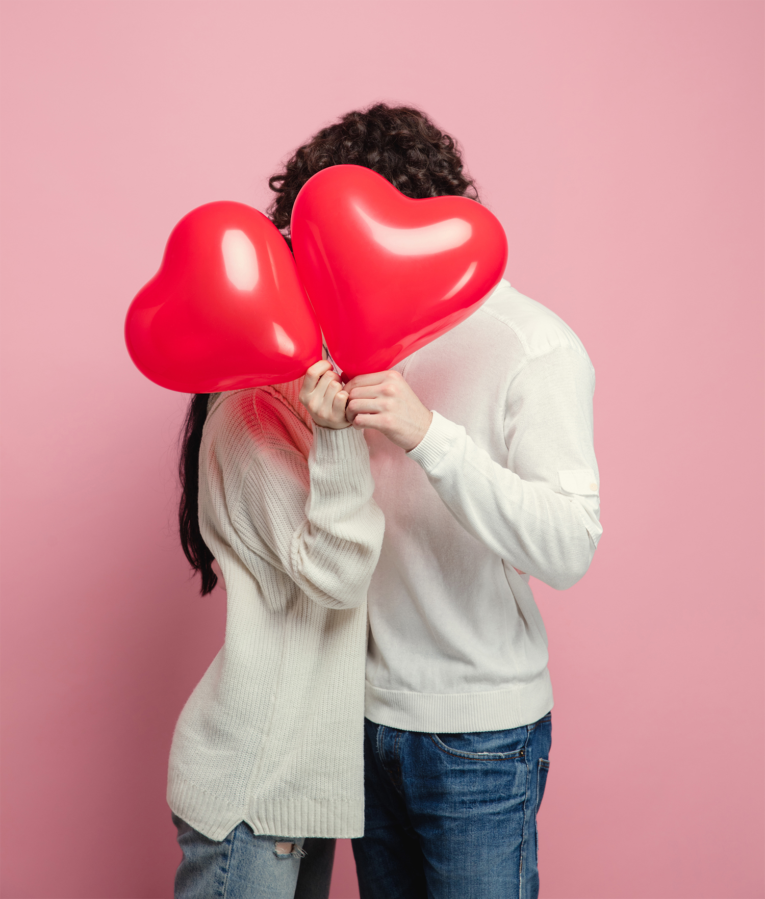 Young, Beautiful Couple In Love On Pink Studio Background. Saint